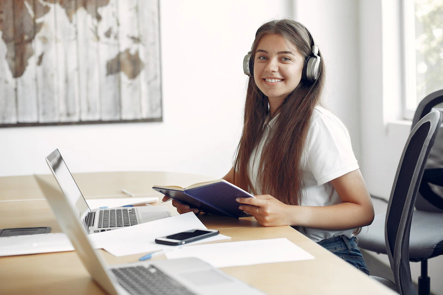 young student sitting table use laptop 1157 27560
